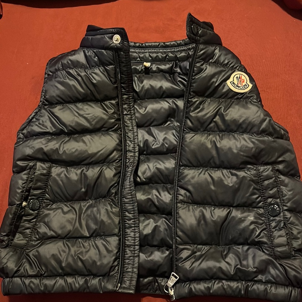 black moncler vest sz 2t , slightly worn .